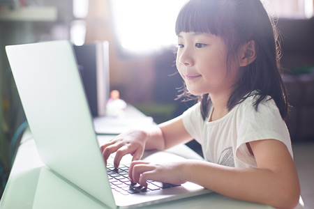 Child Using a Laptop Computer